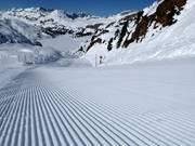Perfectly groomed slope in the Titlis ski area