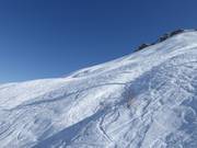 Off-piste slopes below Piz Mundaun