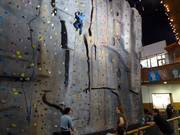 The climbing wall in the foyer of the ski hall