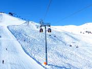 Dorfbahn Königsleiten II - 8pers. Gondola lift with seat heating (monocable circulating ropeway)