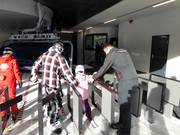 Children are assisted when boarding the 8-seater chairlift.