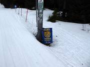 Trash can at a lift tower