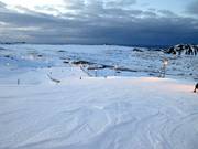 Well-groomed and compact slope