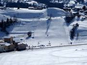 Large beginners’ area at the base station in Brigels (snow sports school area)