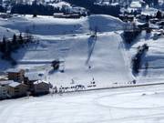 Large beginner area at the valley station in Brigels (Arena of the snow sports school)