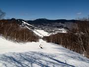 Forest trail descent to the valley station