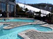 The hotel pools are located right next to the slopes.