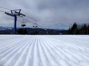 Perfectly groomed slope in the Le Mont Grand-Fonds ski area