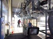 Staff is present when boarding the gondola lift.