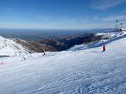 Summit Six chairlift with a view towards Christchurch