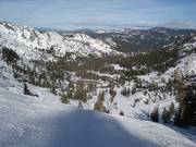Challenging downhill run with a view of the base area