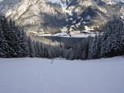Hubertus downhill run with a view of Lake Achensee