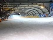 Groomed slope in the indoor ski hall