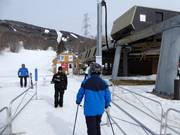 The friendly staff scans the ski pass at the entrance